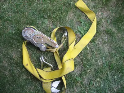 2 inch x 15 ft strap, 5000 lb max, 1650 lb WL, master strap corp. Rachet tie. $10 .....................