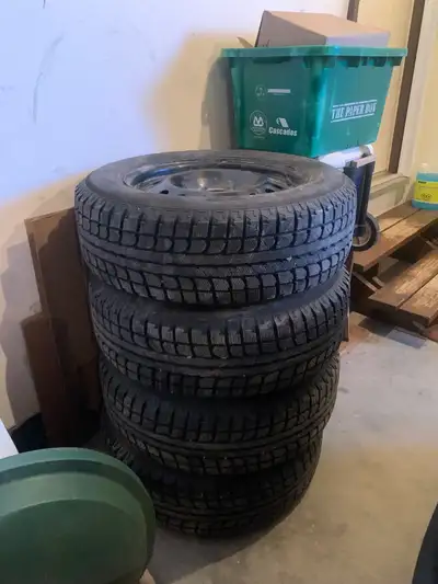 225-65-17, set of 4 tires with rims ,came off a Ford Escape 2018, used only one season, located in B...