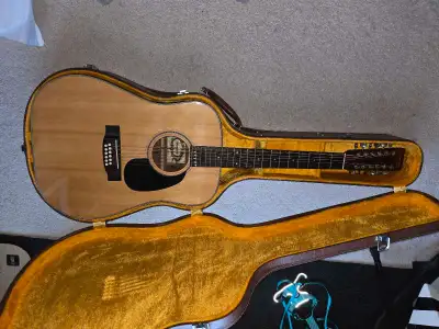 Vintage Japanese Yamaki 12 string guitar. Has a few scratches, but is super clean and doesn't show i...