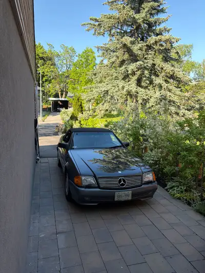 Well-maintained and exceptionally low mileage at just 119,000 km. This elegant two-seat convertible...