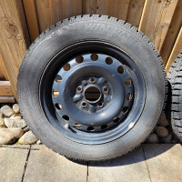 Nexen Windguard WinSpike 185/65/R15 winter tires on steel rims