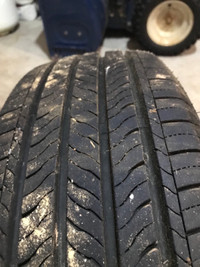 4 All season tires on rims (4 bolt pattern rim) 185/65/r15
