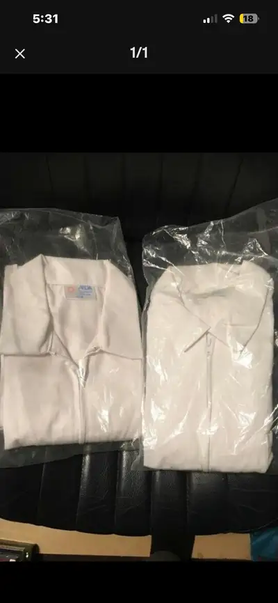 4 white Pharmacy uniform jackets, View more