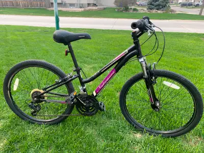 Nakamura youth mountain bike, 24” wheels. 21 speed, front shocks, shimano hardware, quick release fr...