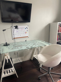 IKEA glass desk with white leather chair