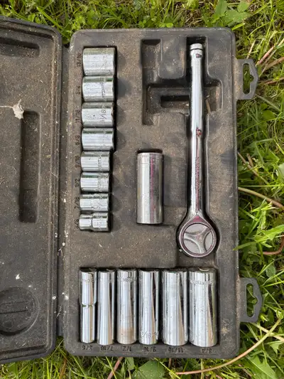 This is a used Craftsman socket set, perfect for various tasks. The set includes a range of sockets...