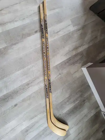 2 right handed NEW wood hockey sticks , View more