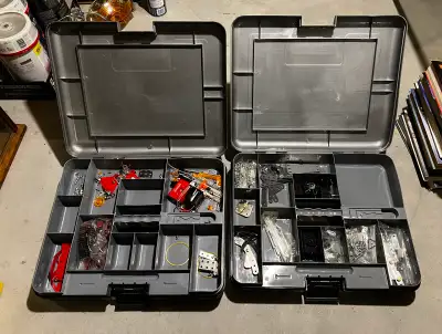 Dive into the world of engineering with this Meccano set, complete with two cases full of parts for...