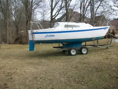 Full refurbish- VHS, Solar panel, large deep cycle battery, 4 sails in good condition- main sail ful...