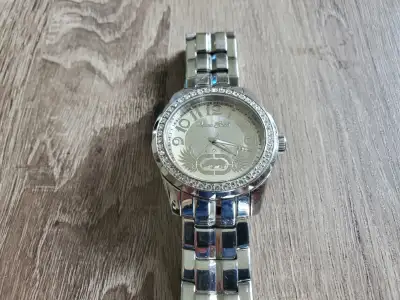 For sale are three watches: 1). Marc Ecko - stainless steel case, crystals around bezel. Extra links...
