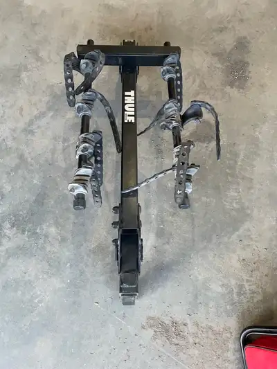 Thule 4 bike rack, hitch mount. Excellent condition. $400 new. Pick up in Okotoks or can meet in Dow...