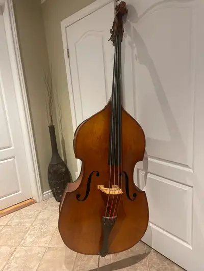 Upright bass, German made comes with bow.