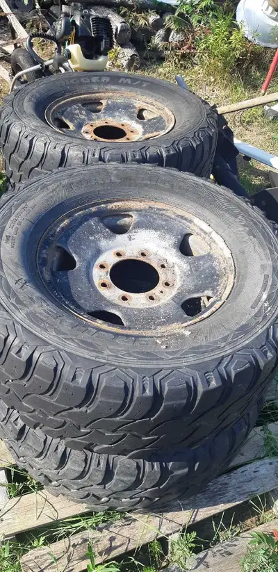 4 8x170 Rims from a 2001 F250. 3 tires are decent, one is DONE. Will fit other years as well. (99-06...