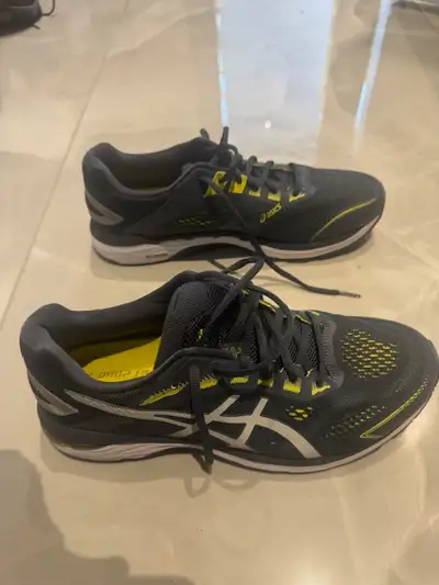 Almost new. Shoe was worn once. ASICS GT-2000 7. Size 11 Wide. Tarmac/Yellow spark colour. Can meet...