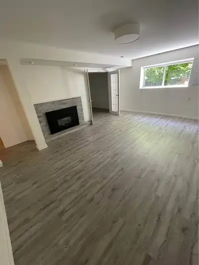 Garden-level suite in a house with in-suite laundry (washer and dryer), air conditioning, and shared...
