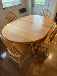 Oak pedestal table and chairs 