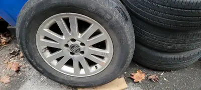 I'm selling a set of used Volvo alloy rims with tires, sized at 235/65R17 104H, perfect for upgradin...