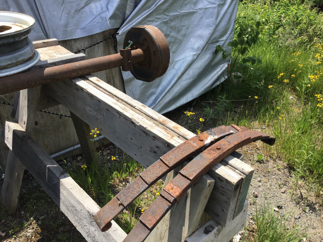 Trailer axle with rims and leaf springs. in Other Parts & Accessories in Sudbury