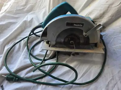 I'm selling a used Makita circular saw, model 5007NB. It's a reliable tool for cutting wood and othe...