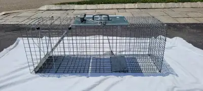 STILL LIKE BRAND NEW USE ONCE ONLY. Ideal for trapping raccoons, stray cats, groundhogs (woodchucks)...
