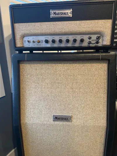 Marshall ST20 head and cab, only used at home. Cab is loaded with the stock cream backs. Everything...