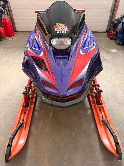 1997 Yamaha mountain Max 700 triple, runs very good and is in excellent shape. -136 1 3/4 track -C&A...
