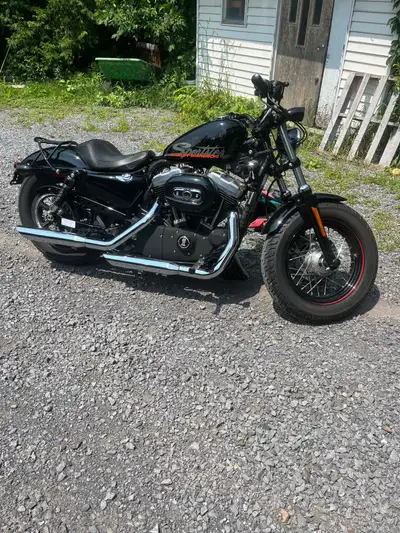 Hayley Davidson sportster 48 2010 a vendre problème de dos je ne peux plus faire de moto à mon grand...