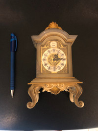 Vintage winding schmid musical alarm clock. 7.5”x4”x3”.