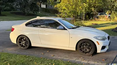 2014 BMW M235i with rear-wheel drive / 8-speed automatic transmission. Excellent condition interior,...