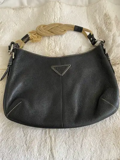 I have a beautiful PRADA purse that has a damaged handle. I do not want to sell tje purse. I need so...