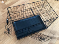 Cage en métal avec poignée pour chien et lit 45$