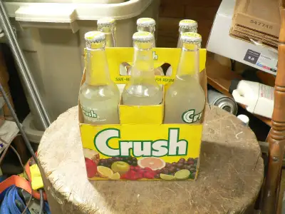 rare 6 pack grape fruit crush # 12523.1 plein de 1956 bonne condition 100$ aller voir mes autres ann...