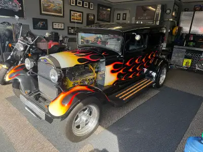 Norm 1930 Ford Model A 2dr sedan .This car has been made into a hotrod ! The motor is from a 72 Impa...
