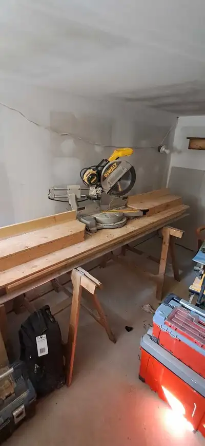 Dewalt DW 708 dual tilt 12" sliding compound mitr saw. $350. Table top $50