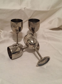 ANTIQUE SET OF FOUR E . P BRASS  GOBLETS FROM SPAIN FOR SALE .