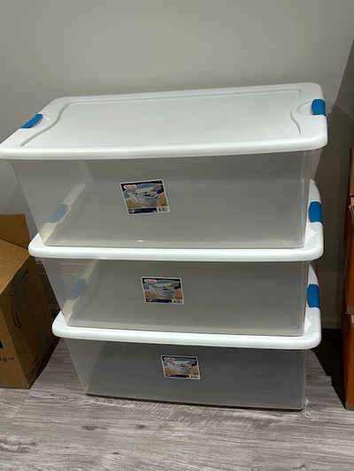 4 large plastic storage boxes, View more