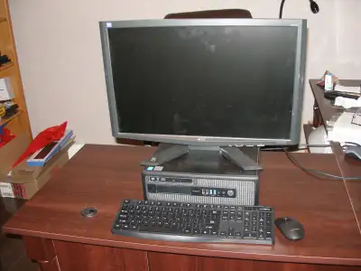 Desktop computer with 24 inch monitor., View more