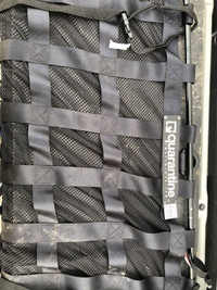 Quarantine vehicle interior cargo restraint system