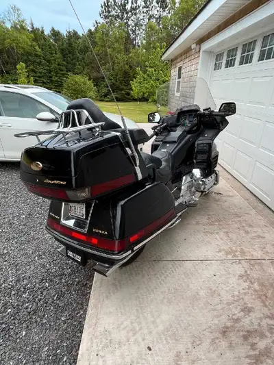Take a ride on this iconic 2000 Honda Goldwing 1500cc, a touring legend with 66321 kilometers on the...