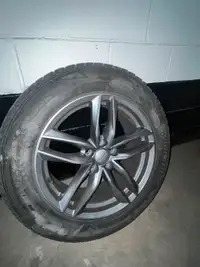 Winter tire on rims BRIDGESTONE 235/60/18.  AUDI Q5.   5 112