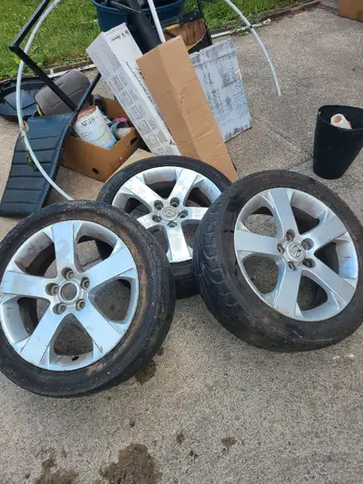 3 mags for mazda 17 inch , 1 center cap missing