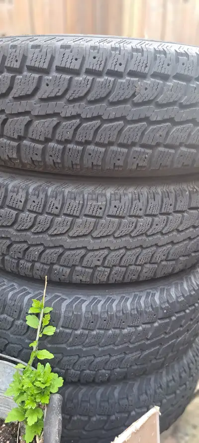 Like new set of 4 Snow tires mounted on Rims fits GM small truck or SUV