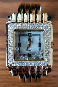 Gold-Coloured Bangle Watch
