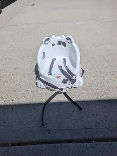 Cow theme booster seat.