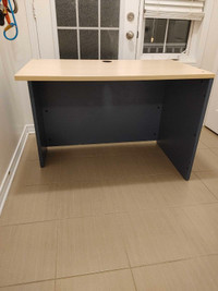 Desk, blue and with light-toned wood top