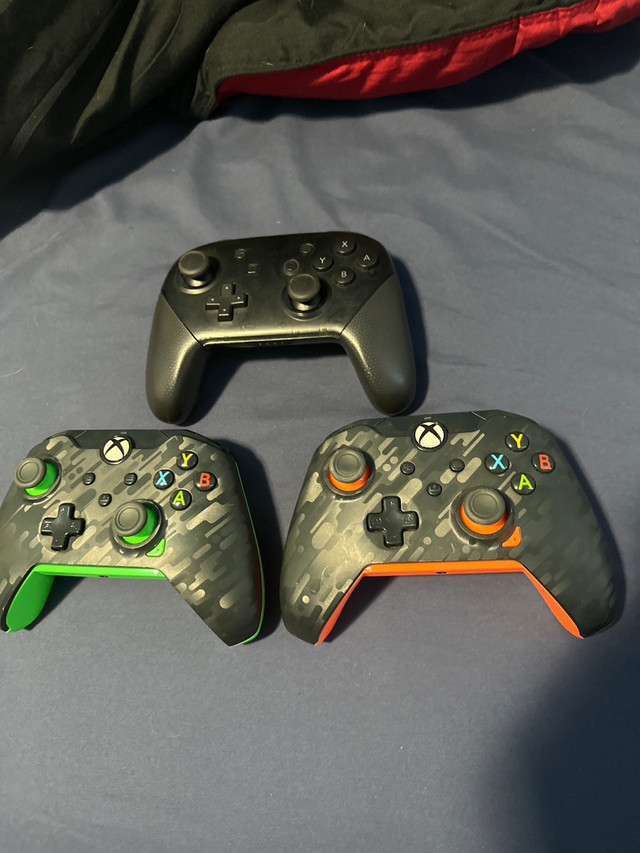 Nintendo switch and xbox controllers in XBOX One in City of Toronto