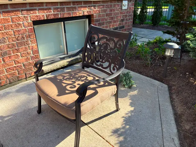 REDUCED PRICE:  TWO cast aluminum OUTDOOR LARGE LOUNGE CHAIRS