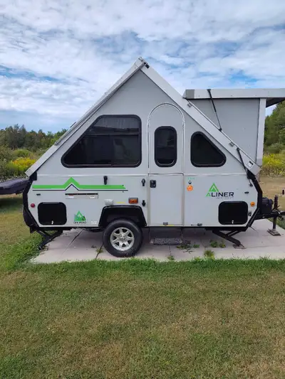 I am selling a well-maintained 2020 Aliner Classic camper, a lightweight and easy-to-tow travel opti...
