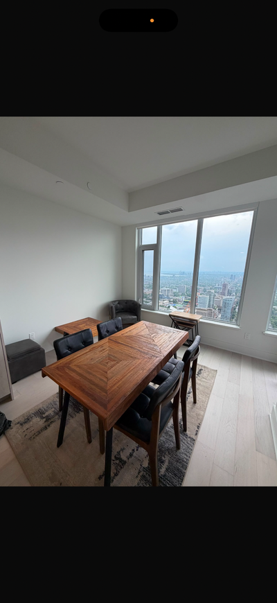 Wooden table and black stunning chairs paid 2800$, View more
