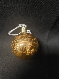 Gold Tone Plastic Snowflake Ornament